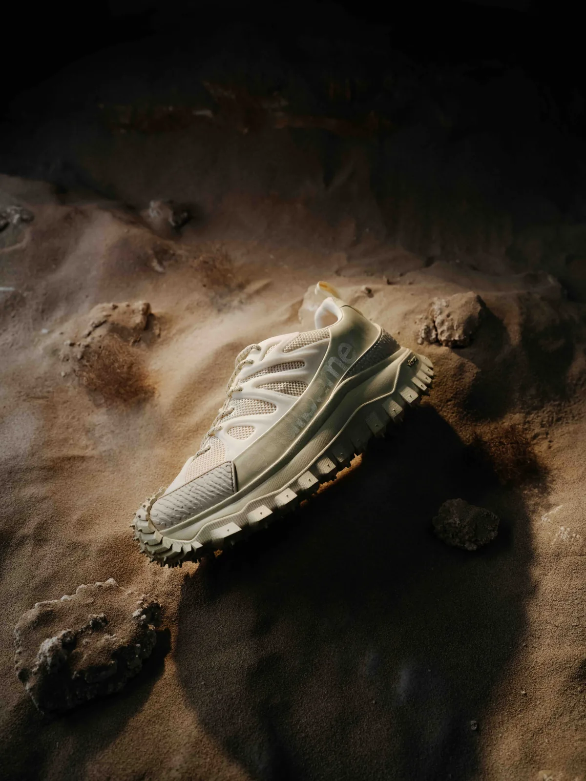 Cinematic still from RESH moncler campaign — frame with sneakers