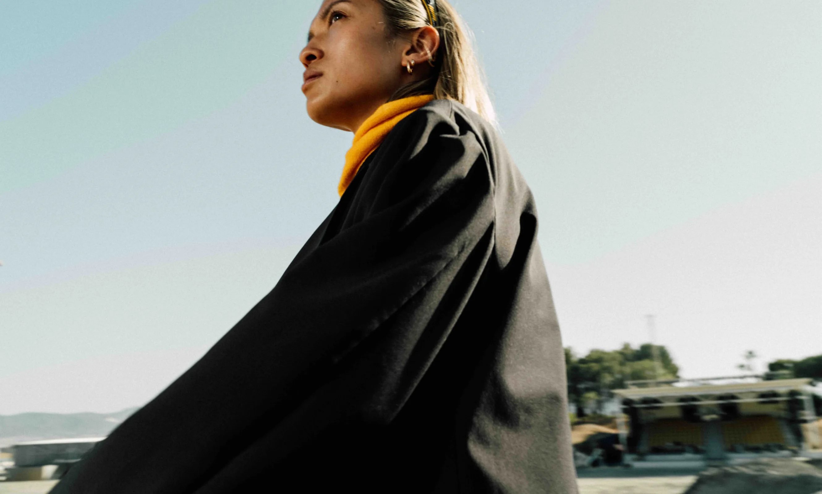 Cinematic still from RESH commercial film — close-up portrait with dramatic lighting